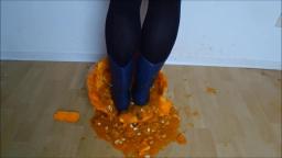 Jana crush a pumpkin with her blue cowgirl rubber boots trailer