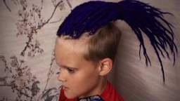 white boy with blue dreads