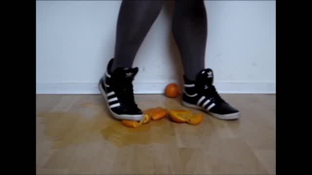 Jana crush oranges with her Adidas Top Ten hi shiny black and white trailer