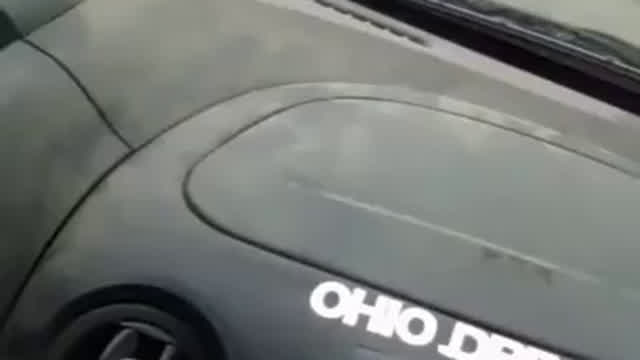 guy driving a car blasting i dont like niggers